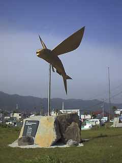 �V���{��